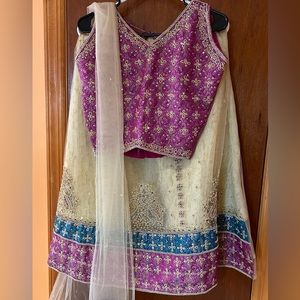 Heavy stone work lehenga for teenagers.